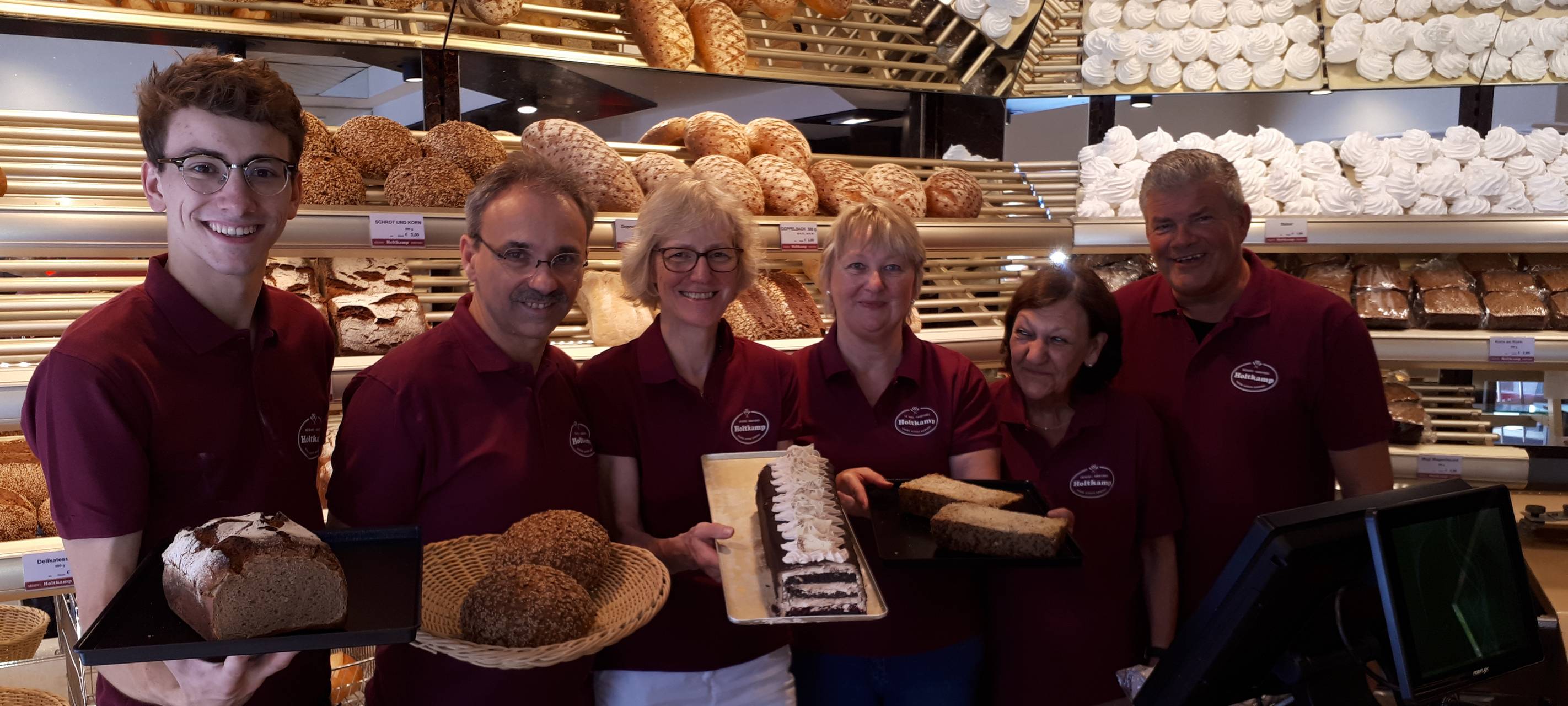Mitarbeiter und Familie in der Bäckerei Holtkamp