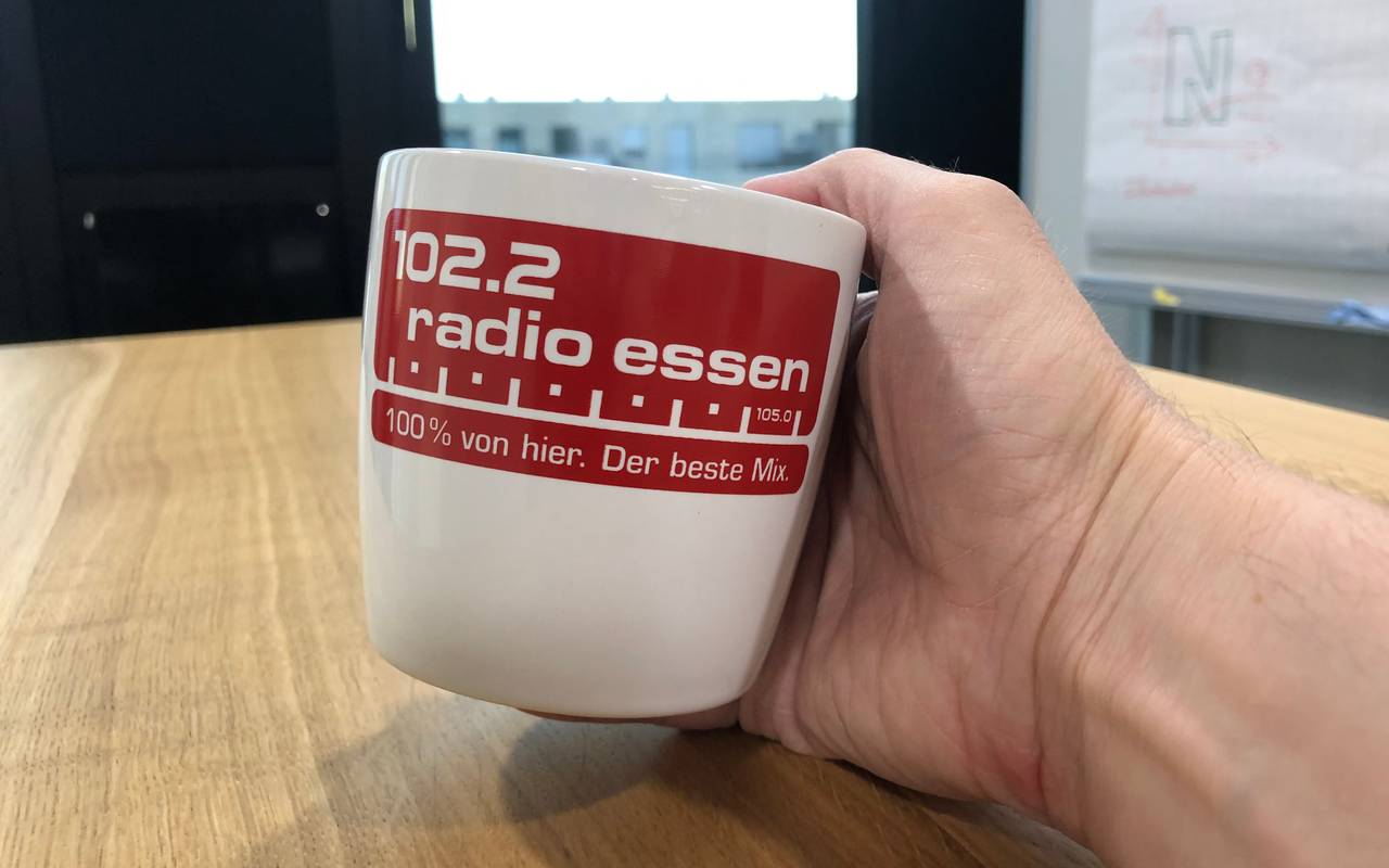 Radio Essen Tasse in Hand