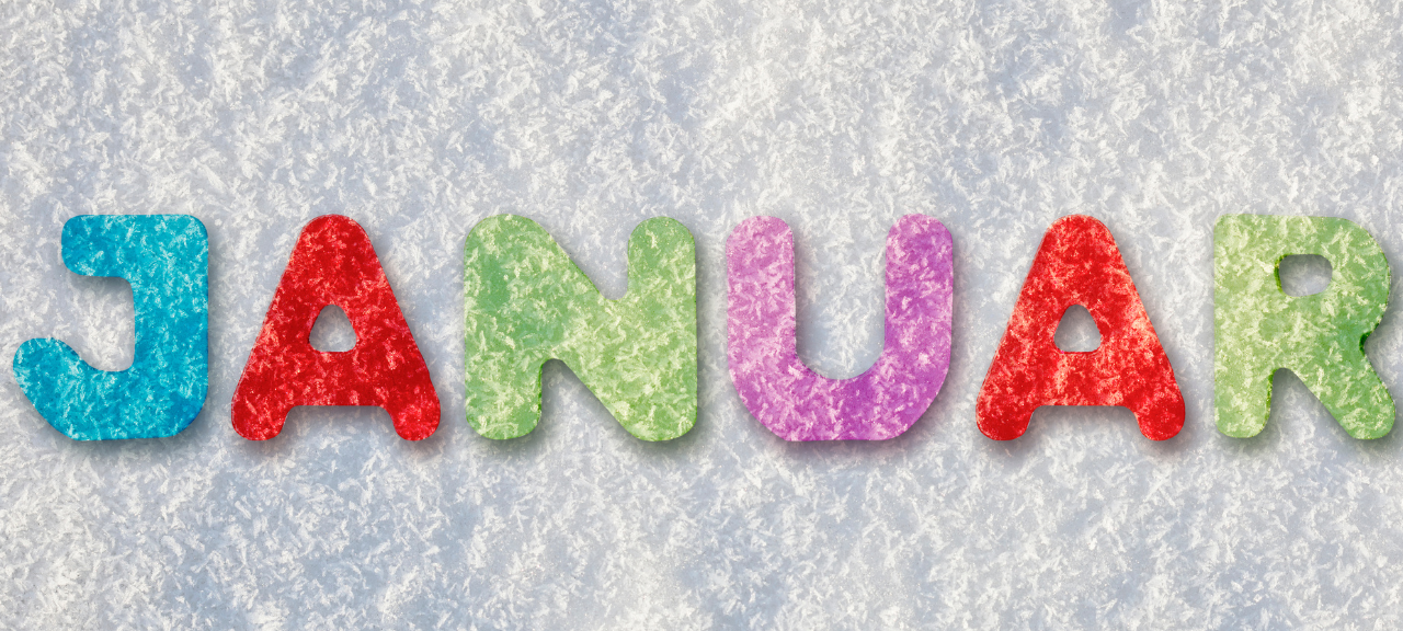 Januar gestickt in bunten Buchstaben